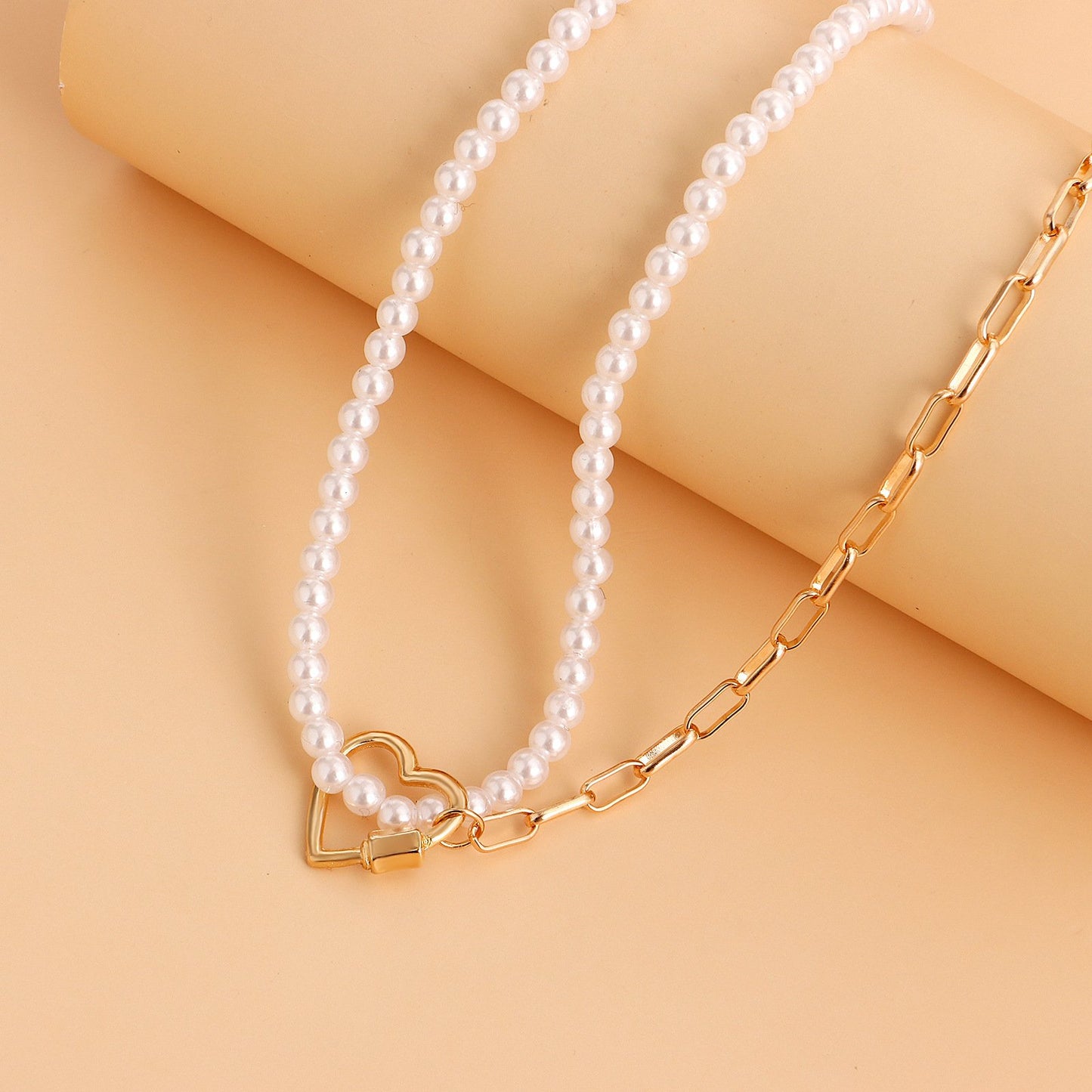 Jewelry ins creative imitation baroque pearl hollow love pendant necklace female necklace niche