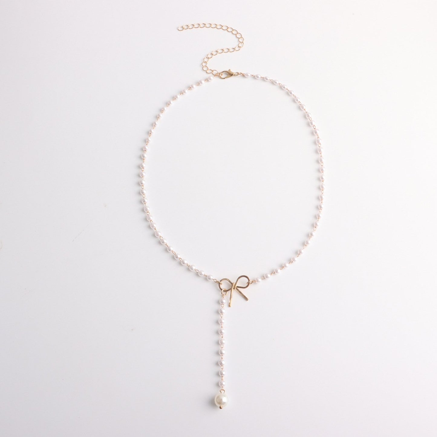 Jewelry Alloy Bow Knot Pearl Tassel Pendant Necklace Ladies Simple Temperament Popular Necklace