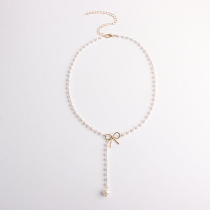 Jewelry Alloy Bow Knot Pearl Tassel Pendant Necklace Ladies Simple Temperament Popular Necklace