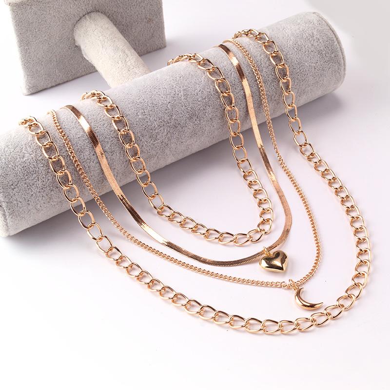 High-end multi-layer metal clavicle chain personality simple and indifferent peach heart moon pendant necklace