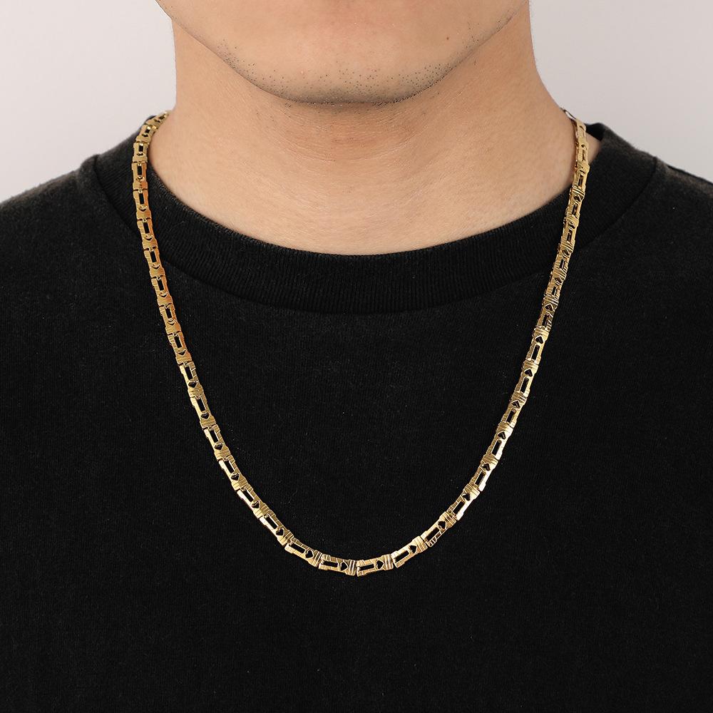 Trendy and fashionable men's stainless steel special-shaped hollow heart-shaped necklace titanium steel long section simple personality couple necklace