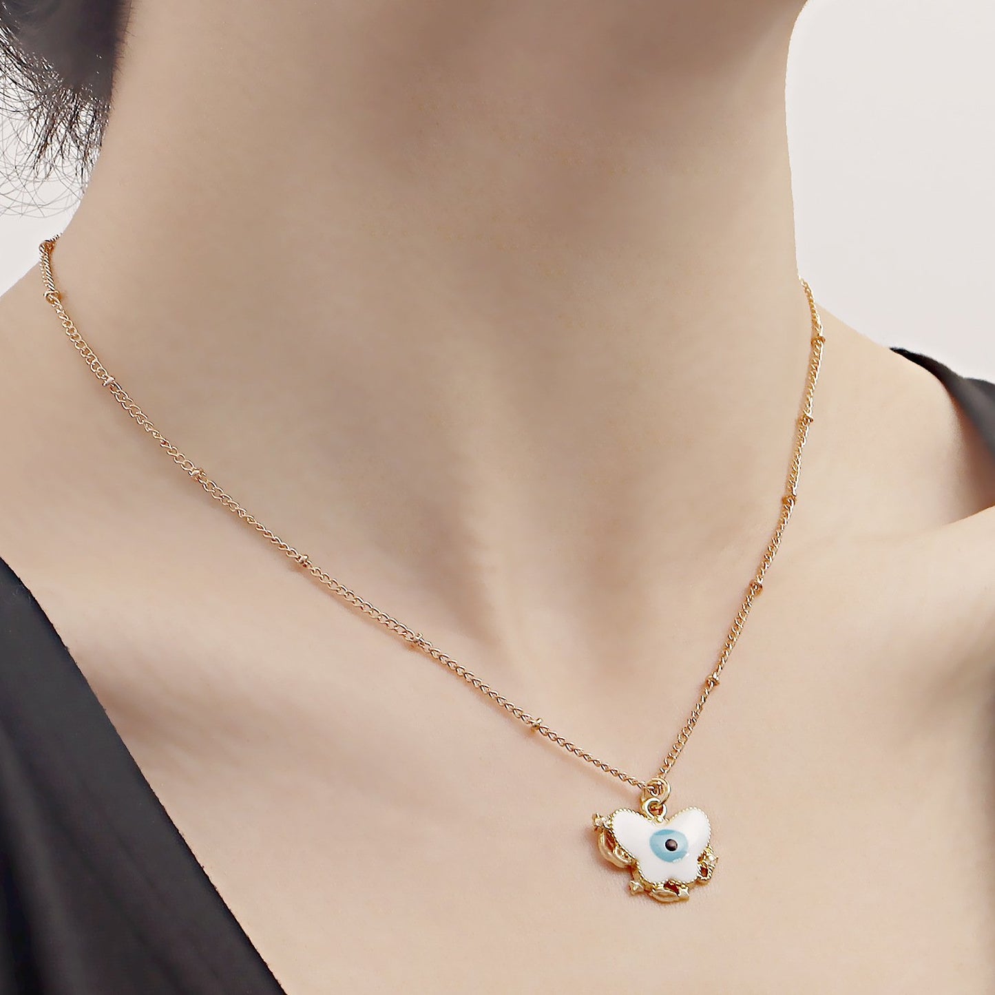 Jewelry ins color dripping oil butterfly devil eye pendant necklace female explosion