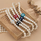 Simple cold beaded imitation pearl color eye necklace sweet cool three-dimensional square pendant single-layer necklace female