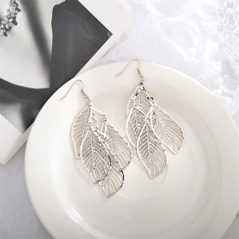 Ethnic retro women's earrings simple hollowed out multi-layered leaf earrings earrings long tassel earrings