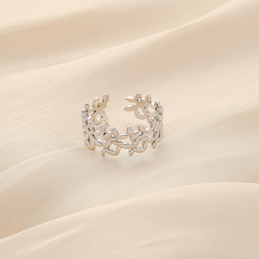 Trendy small fresh stainless steel opening hollow flower adjustable ring