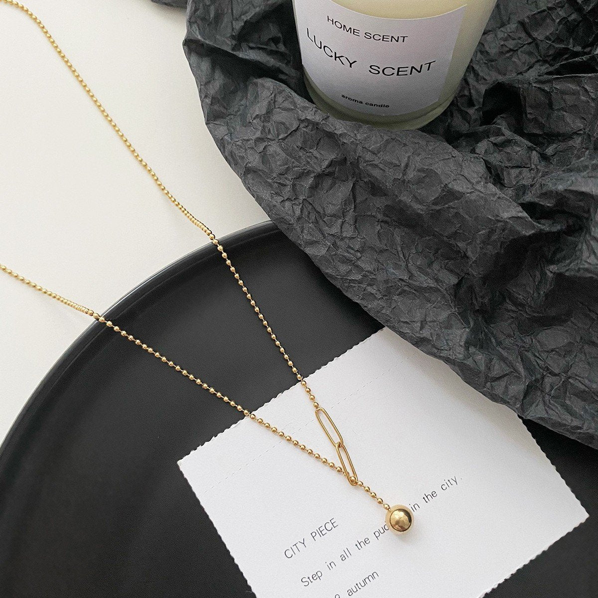 Frosty ins design tassel necklace stitching and pulling small gold ball titanium steel gold-plated clavicle chain