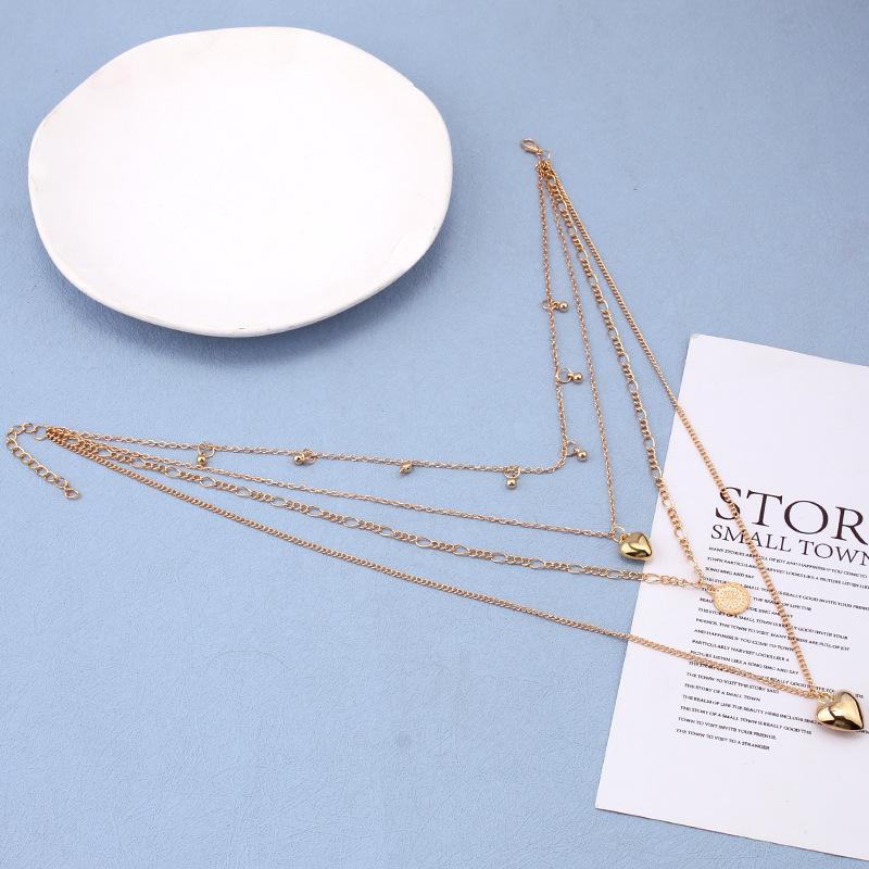 Trendy personality sequins peach heart pendant collarbone chain retro simple multi-layered necklace necklace