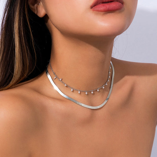 Jewelry cold snake bone chain necklace creative temperament imitation pearl tassel double layer necklace female