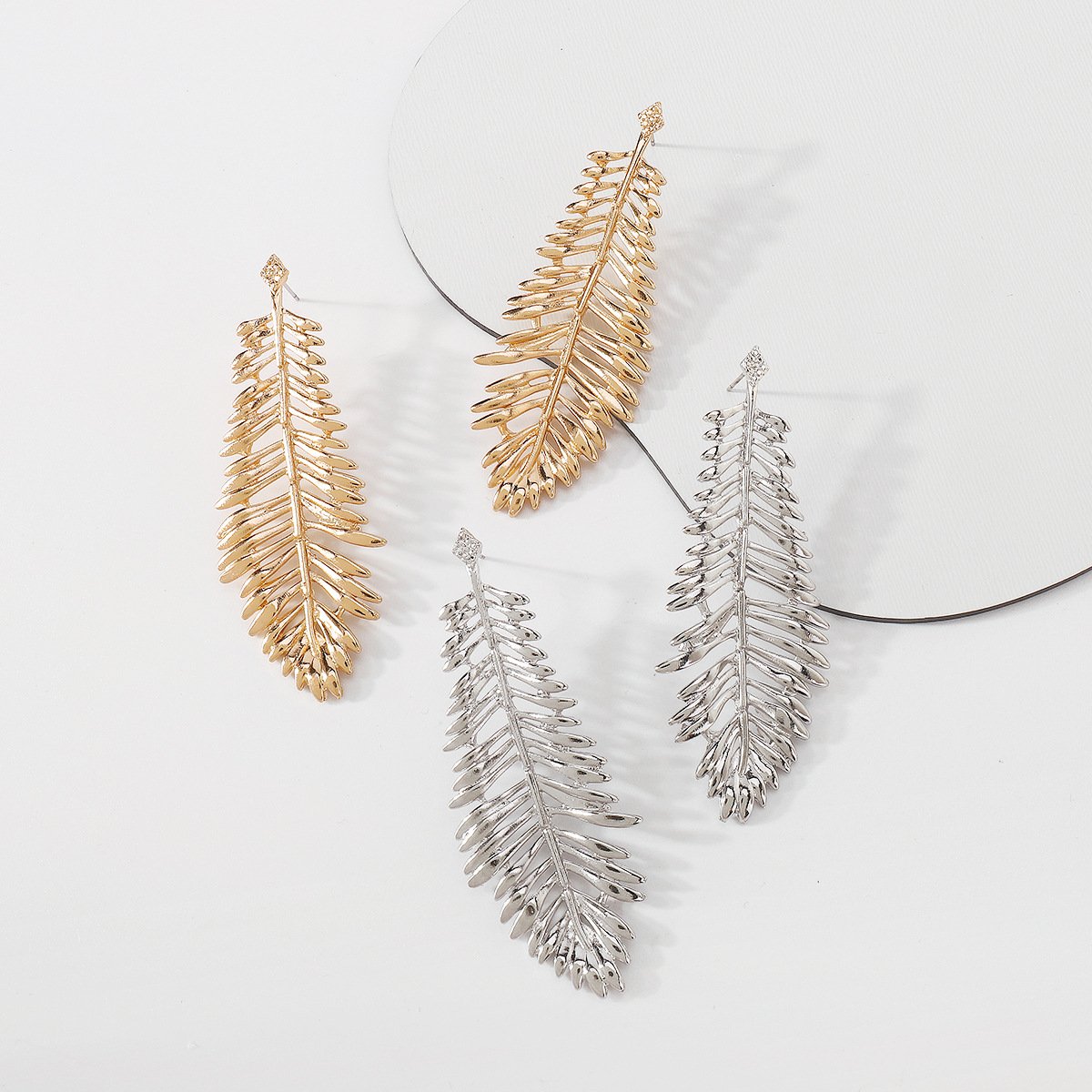 E1414 Simple Metal Earrings Creative Hollow Feather Leaf Earrings Cold Personality Earrings