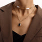 Jewelry fashion double-layer special-shaped pearl bamboo chain black zircon pendant necklace female punk