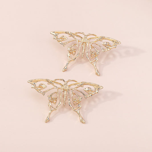 E1895 Personality Hollow Sweet Butterfly Earrings Niche Metal Cold Creative Geometric Earrings Women