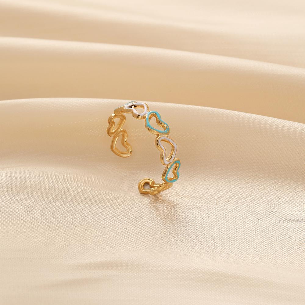 Small and exquisite women's stainless steel creative opening adjustable hollow heart ring