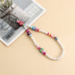Jewelry ins imitation pearl color soft pottery mobile phone chain beaded pendant anti-lost lanyard accessories