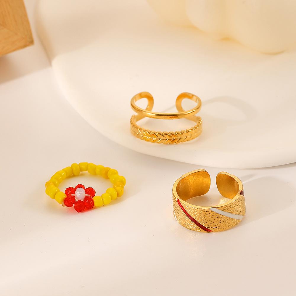 Light luxury niche fashion simple personality stainless steel handmade beads Shaohua wheat ears open ring set for women