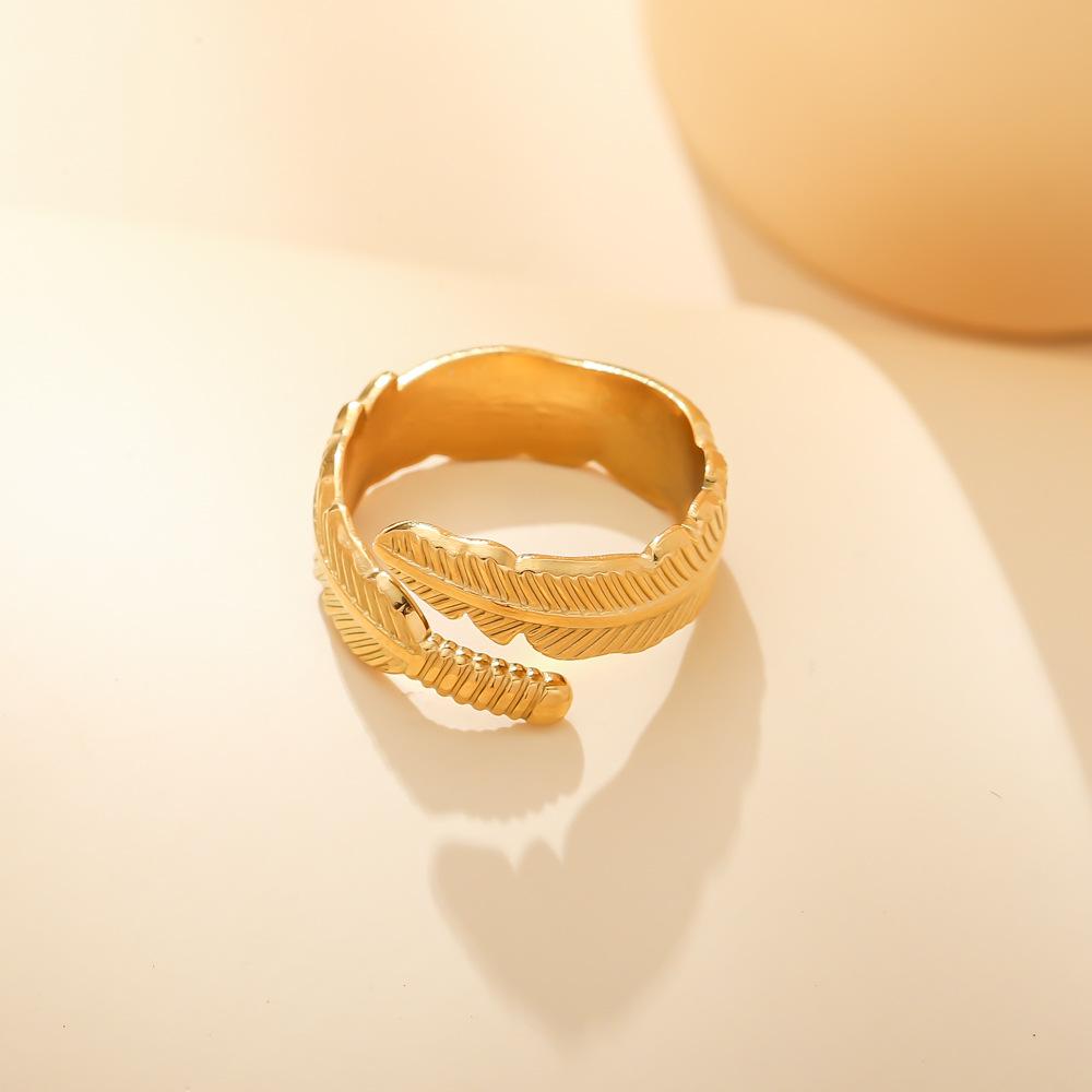 Fashion personality creative stainless steel open ring feather men and women titanium steel simple ins ring