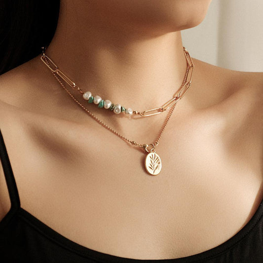 Fashion personality ins double-layer pearl crushed stone turquoise leaf pendant necklace clavicle chain female