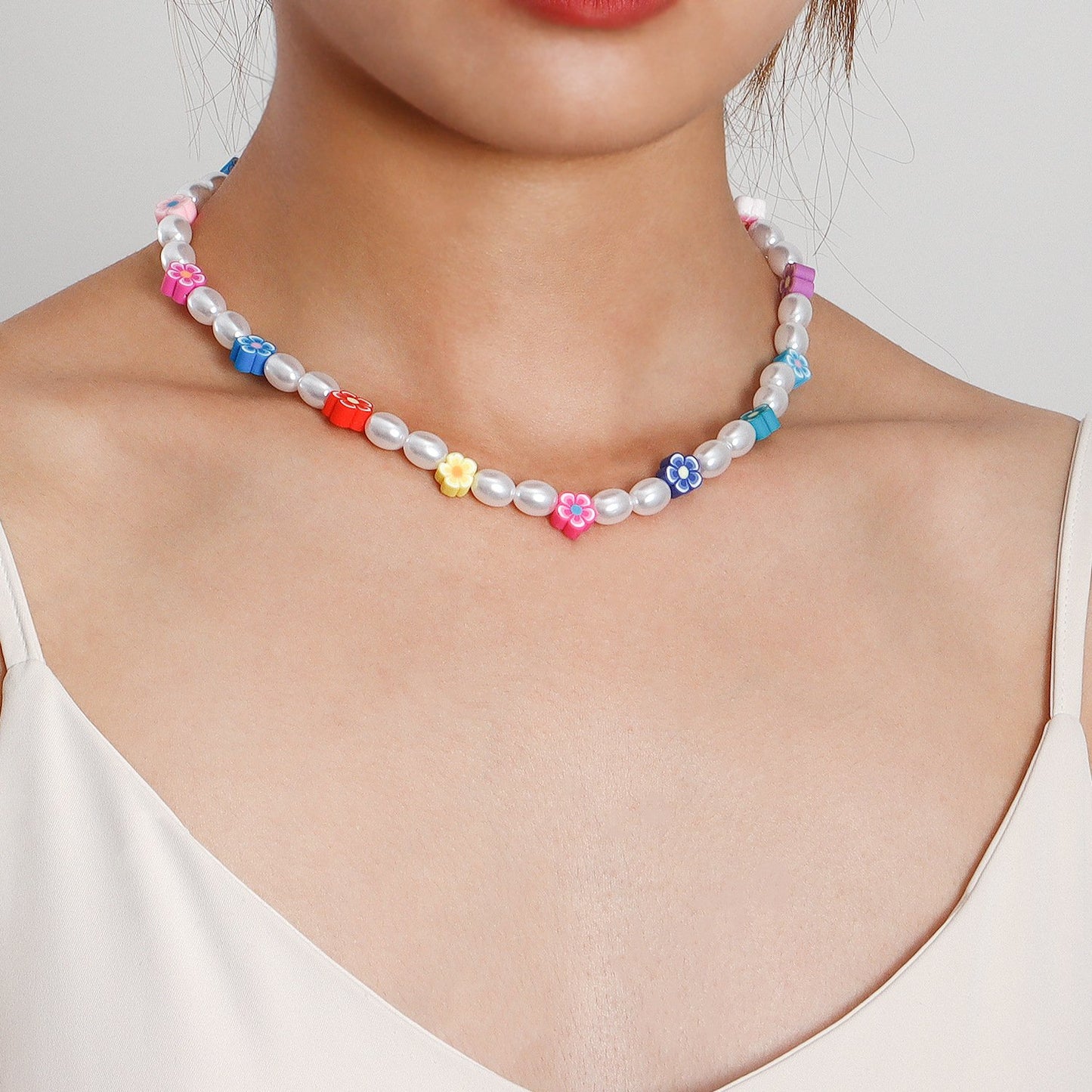 Jewelry acrylic pearl creative simple ladies necklace ins soft pottery flower pendant