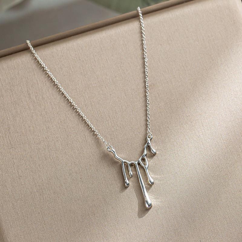 Cold and fresh water drop lava necklace female dark love earrings female minority design sense irregular heart-shaped earrings