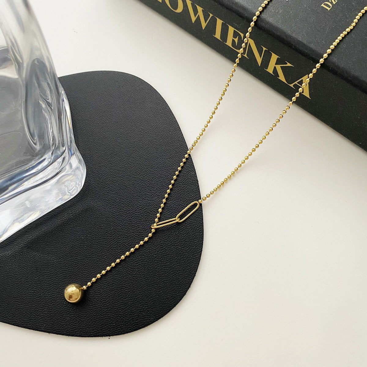 Frosty ins design tassel necklace stitching and pulling small gold ball titanium steel gold-plated clavicle chain