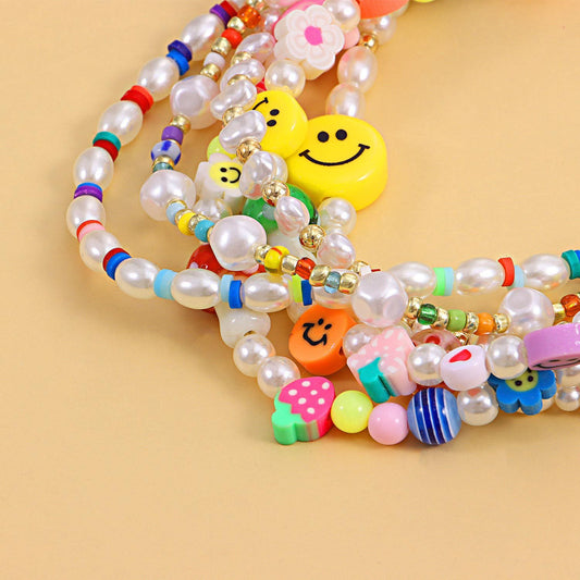 Jewelry multi-element fashion trend pearl necklace cartoon painted soft pottery fruit smiley necklace