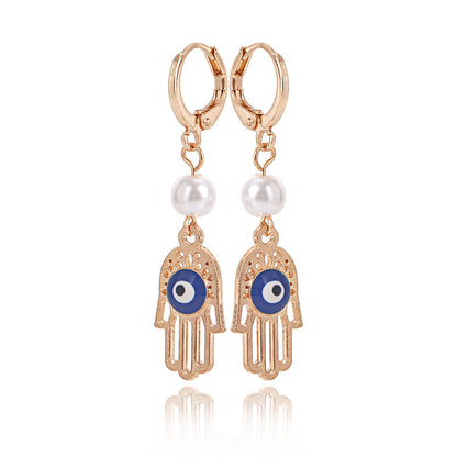 Fashion personality devil's eye palm pearl earrings women's hot style popular creative earrings