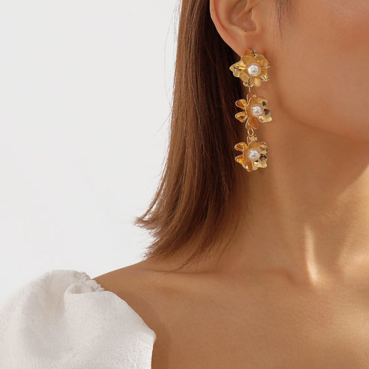 E118 Simple three-dimensional metal flower earrings cold design pearl long temperament earrings