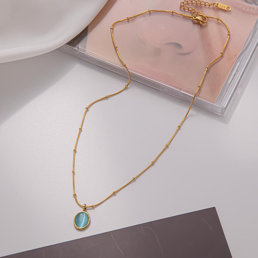 Simple niche light luxury oval titanium steel necklace blue cat's eye pendant clavicle chain temperament design high-end jewelry