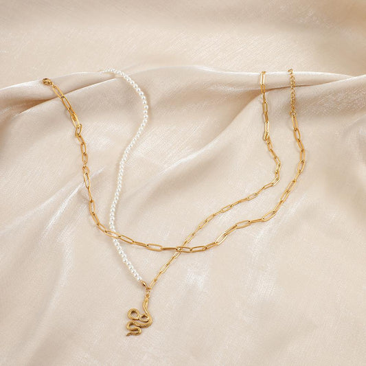 Fashion and simple temperament stainless steel gold double-layer pearl snake pendant necklace collarbone chain all-match