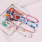Simple Bohemian soft pottery peach heart mobile phone lanyard mixed color beads mobile phone chain female ornament