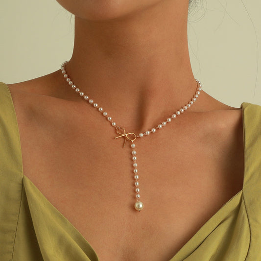 Jewelry Alloy Bow Knot Pearl Tassel Pendant Necklace Ladies Simple Temperament Popular Necklace