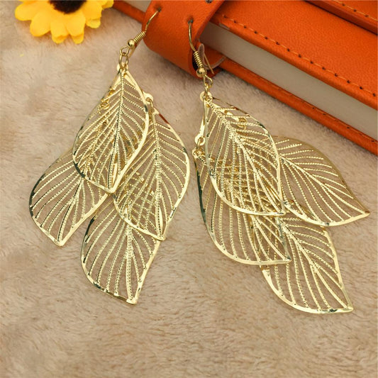 Fashion and personality explosion models hollow four leaves ladies earrings popular earrings stalls
