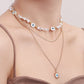 Jewelry ins multi-layer devil's eye beaded necklace female niche design imitation pearl clavicle chain