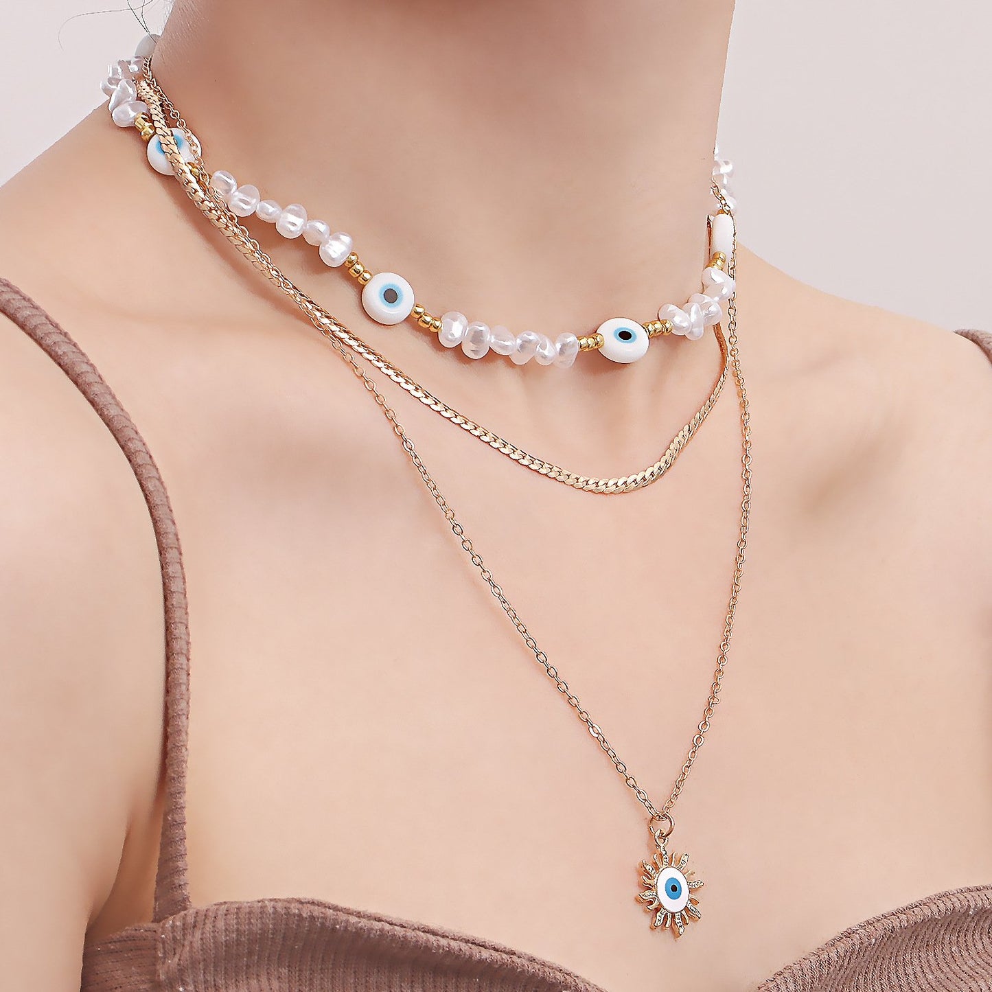 Jewelry ins multi-layer devil's eye beaded necklace female niche design imitation pearl clavicle chain