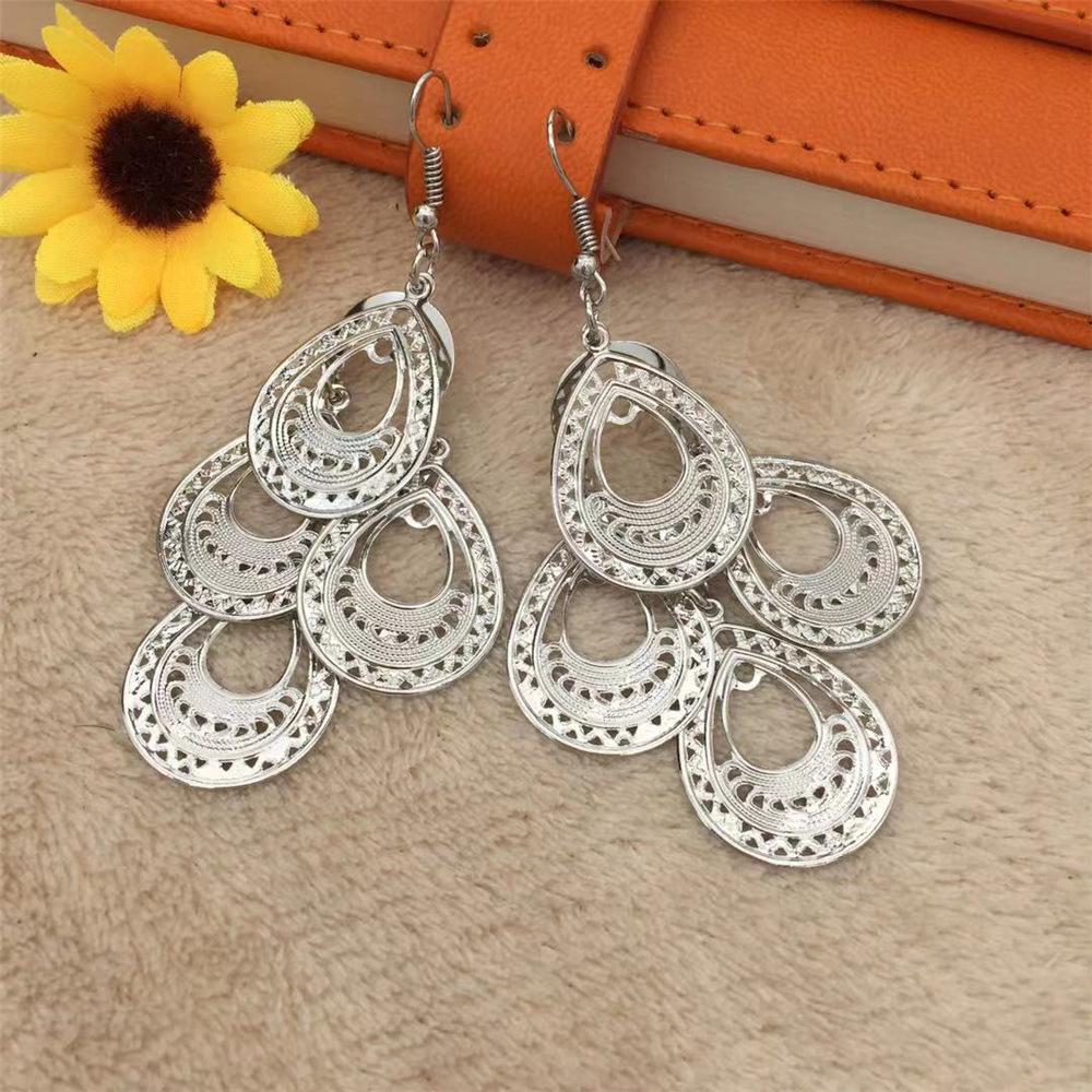 Four-leaf hollow big water drop earrings mixed batch Yunnan minority Dai earrings clothing accessories