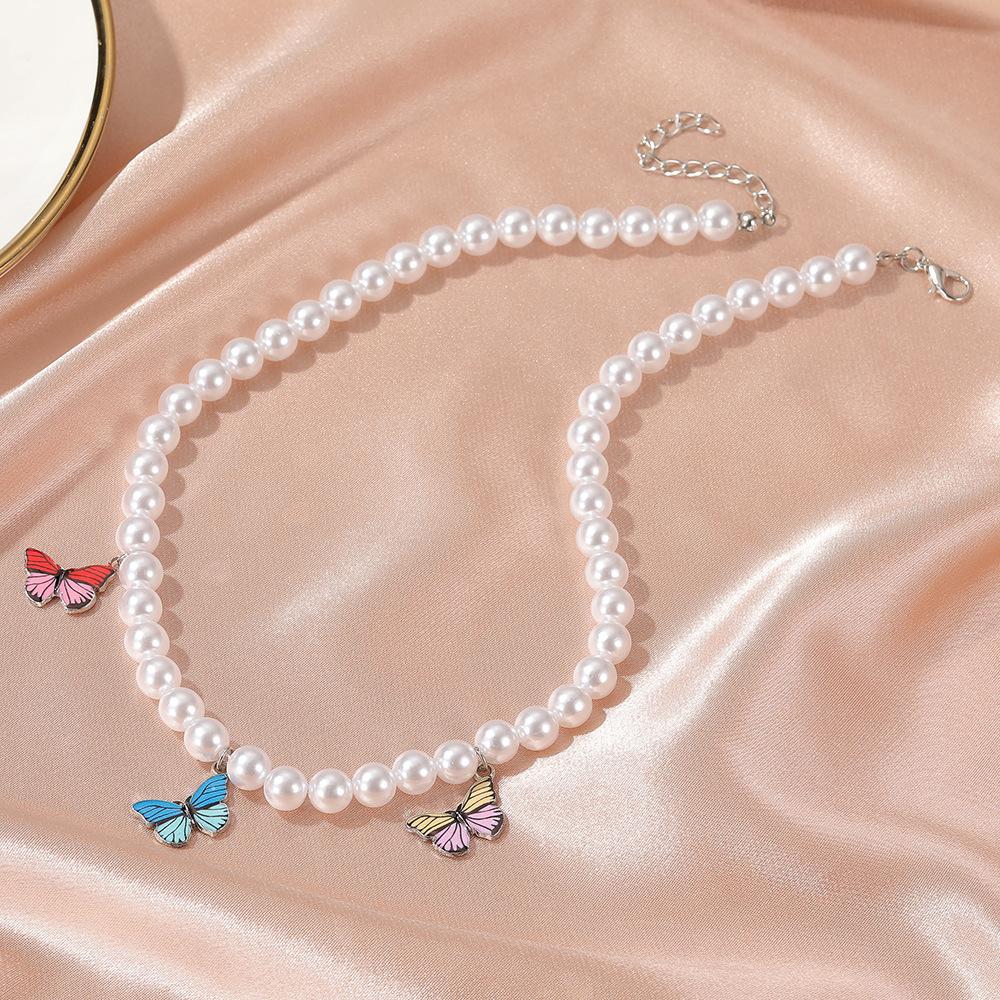 Ins cold temperament pearl necklace fantasy color butterfly clavicle chain simple short ladies necklace