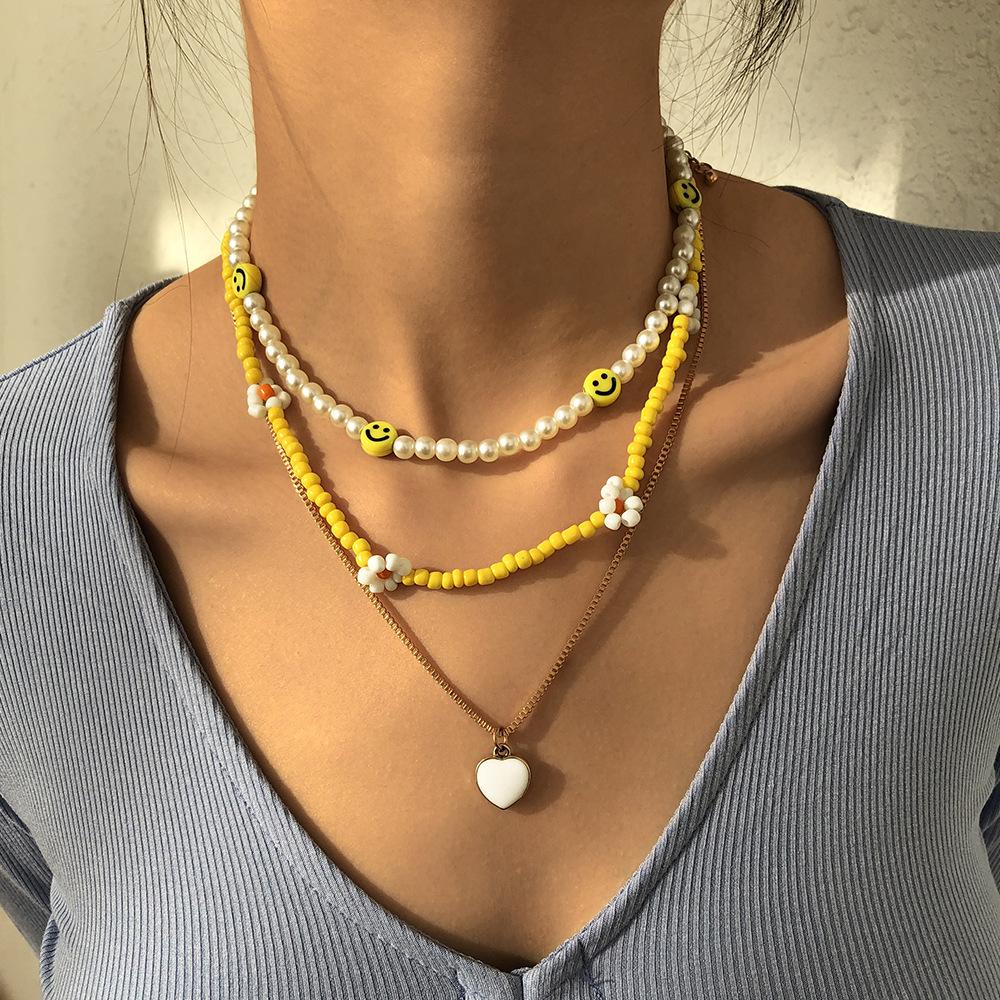 N9524 Bohemian Ethnic Necklace Rice Bead Flower Smile Face Creative Necklace Fashion Simple Necklace