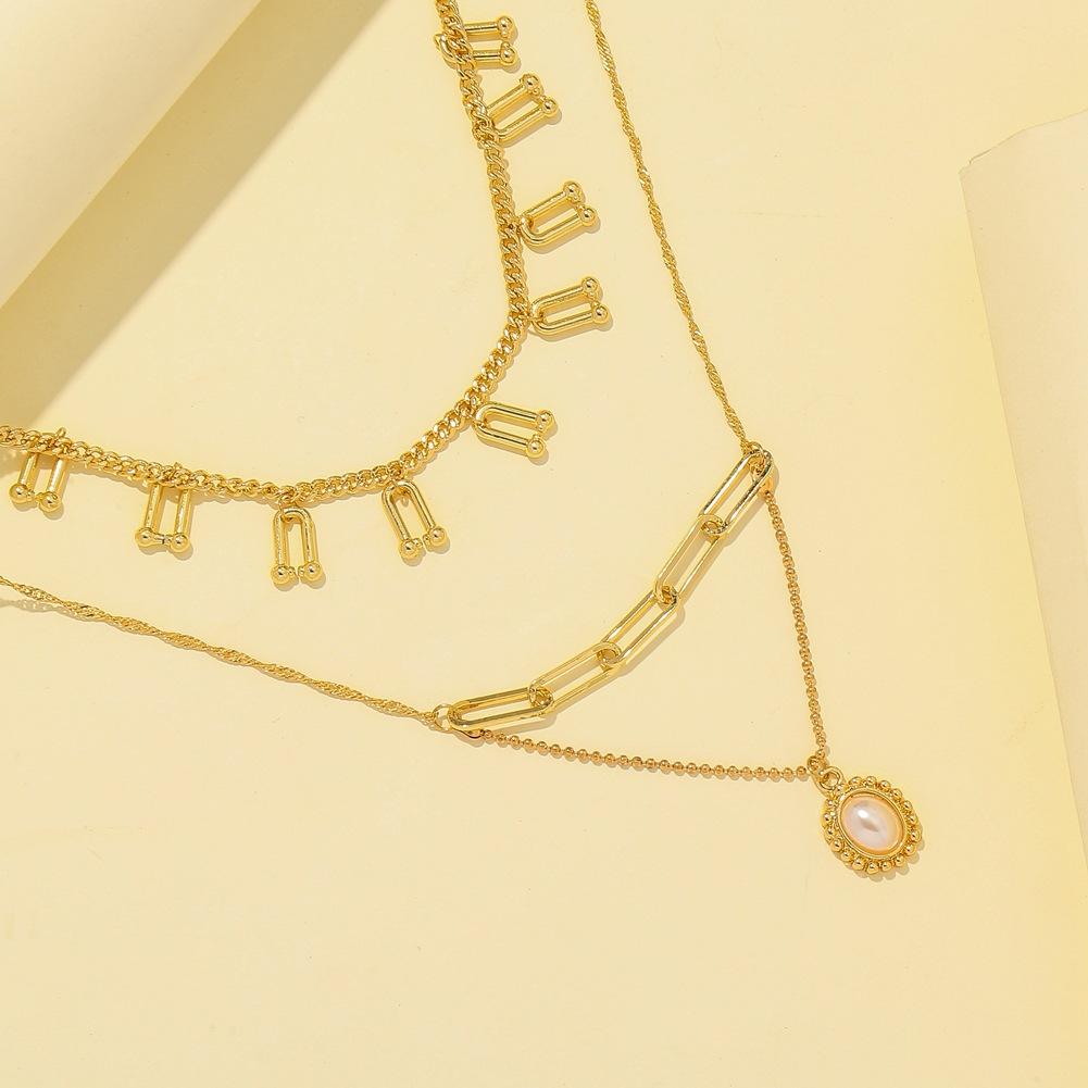 Fashion multi-layer U-shaped horseshoe tassel necklace personality oval pearl pendant clavicle chain jewelry female