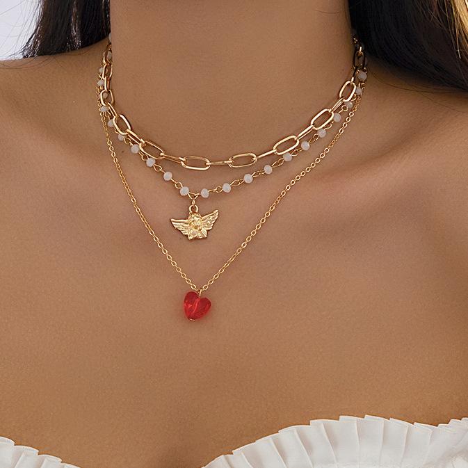 Stacked retro little angel pendant versatile collarbone chain temperament fashion imitation crystal love necklace female
