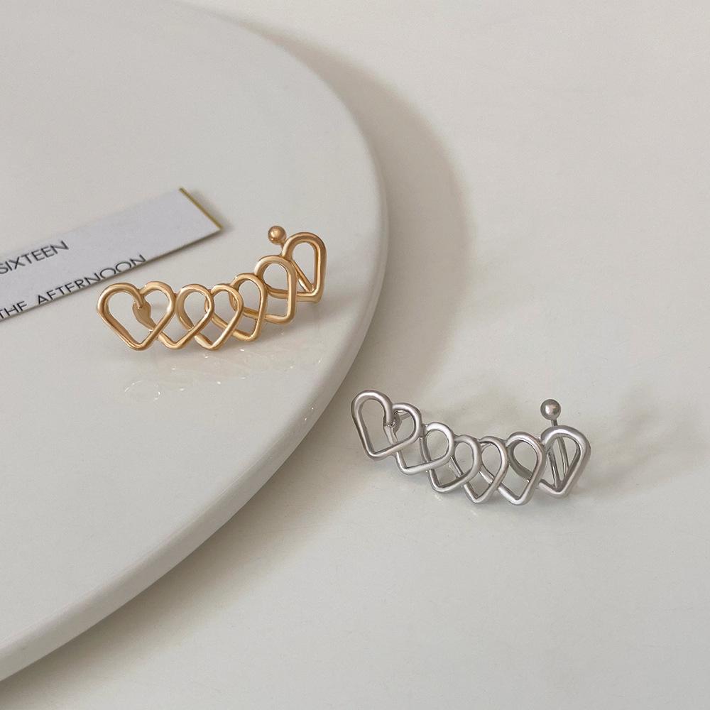 High-end geometric heart ear bone clip earrings retro net red one-piece French style pierced earrings for women