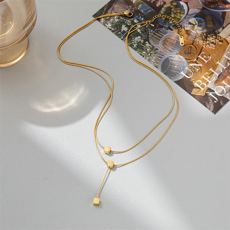 Double-layer small square necklace female small golden ball double-layer hip-hop tassel necklace sweet cool niche light luxury clavicle chain