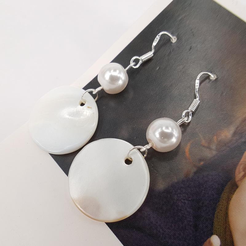 Natural round shell earrings simple pure handmade retro temperament female pearl earrings second hair Aqin same style