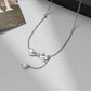 Diamond-encrusted pearl bow tassel necklace female niche design ins sexy clavicle chain simple light luxury net red