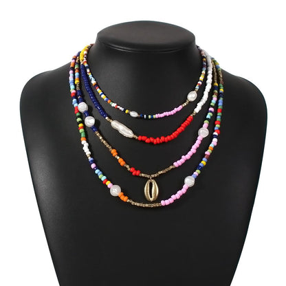 N777 Bohemia Vacation Rice Bead Necklace Female Fashion Ethnic Imitation Pearl Clavicle Chain Alloy Pendant