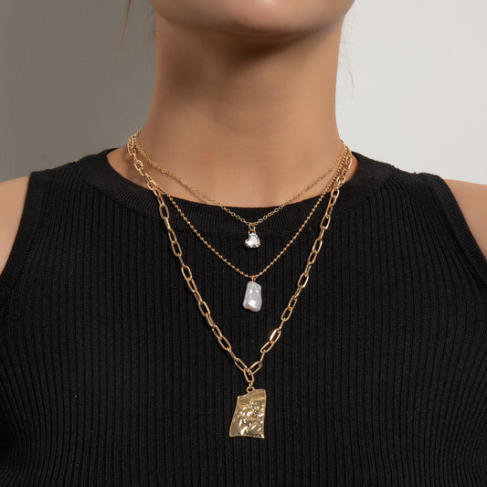 Jewelry trend multi-layer love diamond pearl alloy pendant fashion personality short sweater chain